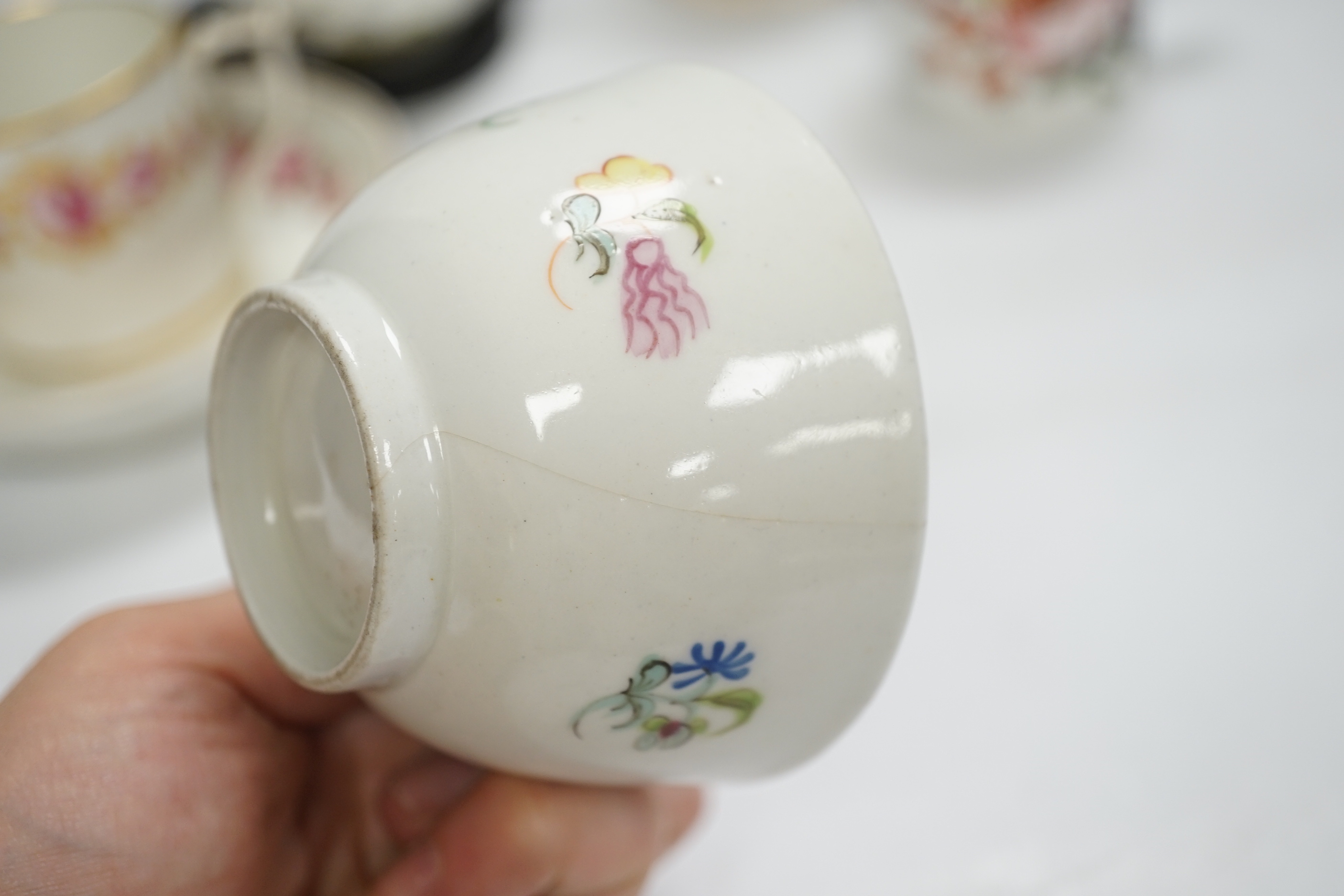 Two Derby porcelain coffee cans and one saucer, a tea bowl, a pearlware mug and a mid 18th century Meissen cup and saucer, tallest mug 8cm high